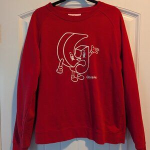 Glossier Red Holiday Sweatshirt.